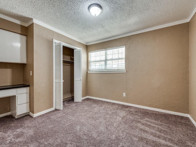 3836 Diamond Loch E, North Richland Hills, TX 76180 - unfurnished bedroom with crown molding, a textured wall, a textured ceiling, carpet, and built in desk