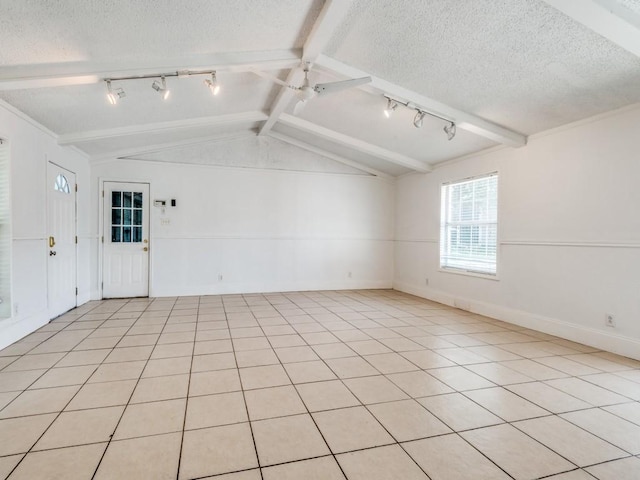 3836 Diamond Loch E, North Richland Hills, TX 76180 - unfurnished room featuring rail lighting, a textured ceiling, and a ceiling fan