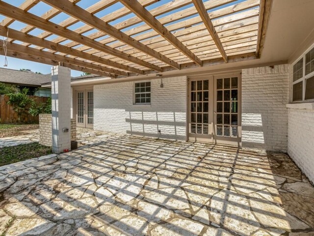 3836 Diamond Loch E, North Richland Hills, TX 76180 - view of patio / terrace featuring french doors and a pergola