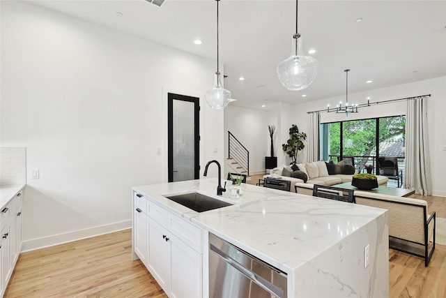 354 Foch St, Fort Worth, TX 76107 - kitchen featuring dishwasher, light wood-style flooring, recessed lighting, open floor plan, and white cabinetry