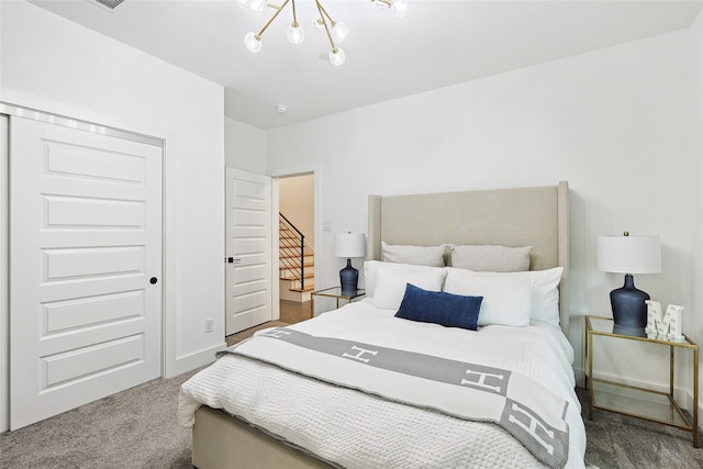 354 Foch St, Fort Worth, TX 76107 - carpeted bedroom featuring a chandelier and a closet