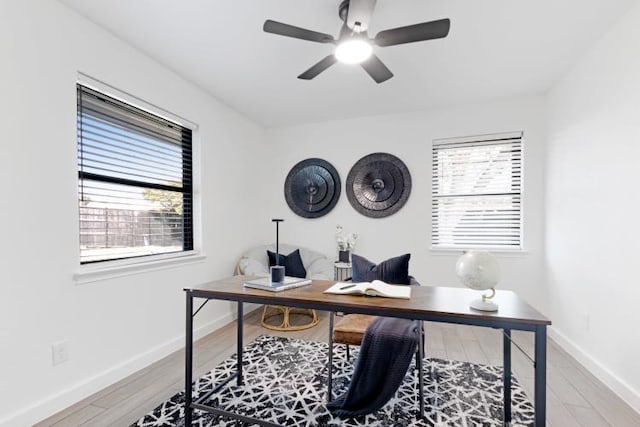 10669 Larchfield Ln, Dallas, TX 75238 - office area featuring a ceiling fan and light wood-type flooring