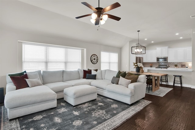 513 Endicott Dr, Sherman, TX 75092 - living area featuring vaulted ceiling, ceiling fan, a chandelier, dark wood-style floors, and recessed lighting