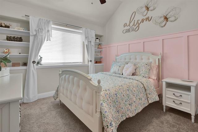 513 Endicott Dr, Sherman, TX 75092 - bedroom with carpet, vaulted ceiling, wainscoting, ceiling fan, and a decorative wall