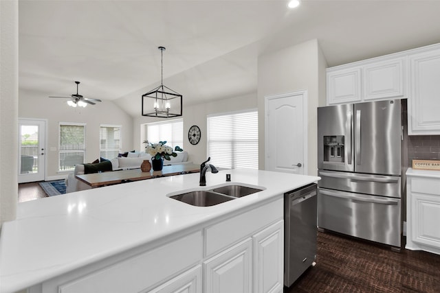 513 Endicott Dr, Sherman, TX 75092 - kitchen featuring stainless steel appliances, light countertops, healthy amount of natural light, and lofted ceiling