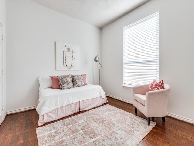1728 Forest Glen Dr, Flower Mound, TX 75028 - bedroom featuring multiple windows and wood finished floors