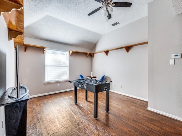 1728 Forest Glen Dr, Flower Mound, TX 75028 - playroom with ceiling fan, a textured ceiling, wood finished floors, and lofted ceiling