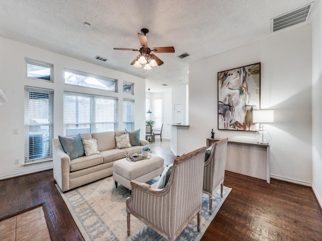 1728 Forest Glen Dr, Flower Mound, TX 75028 - living area with a ceiling fan, wood finished floors, and a textured ceiling