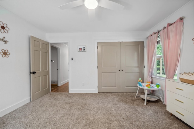 213 N Oaks Dr, Grand Saline, TX 75140 - carpeted bedroom with a closet and a ceiling fan