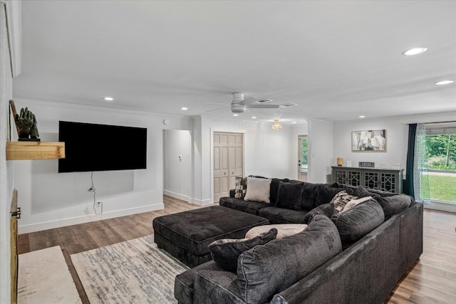 213 N Oaks Dr, Grand Saline, TX 75140 - living area featuring wood finished floors, recessed lighting, ceiling fan, and ornamental molding