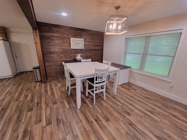 800 County Road 1030, Mount Pleasant, TX 75455 - dining space with wood walls and wood finished floors