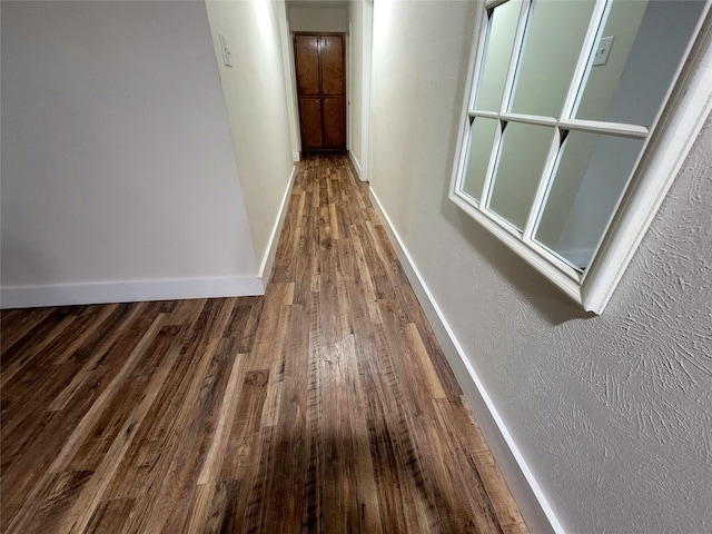 800 County Road 1030, Mount Pleasant, TX 75455 - hall featuring wood finished floors and a textured wall