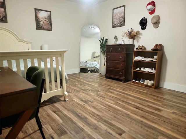 800 County Road 1030, Mount Pleasant, TX 75455 - bedroom with wood finished floors and baseboards