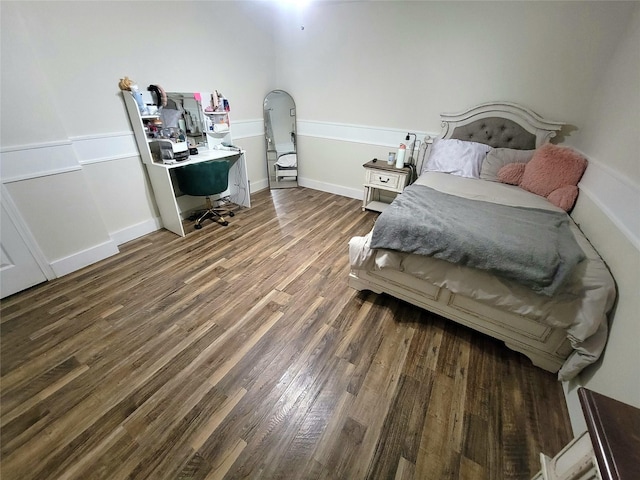 800 County Road 1030, Mount Pleasant, TX 75455 - bedroom featuring a desk and dark wood finished floors