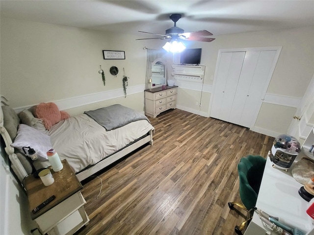 800 County Road 1030, Mount Pleasant, TX 75455 - bedroom featuring wood finished floors, a closet, and a ceiling fan