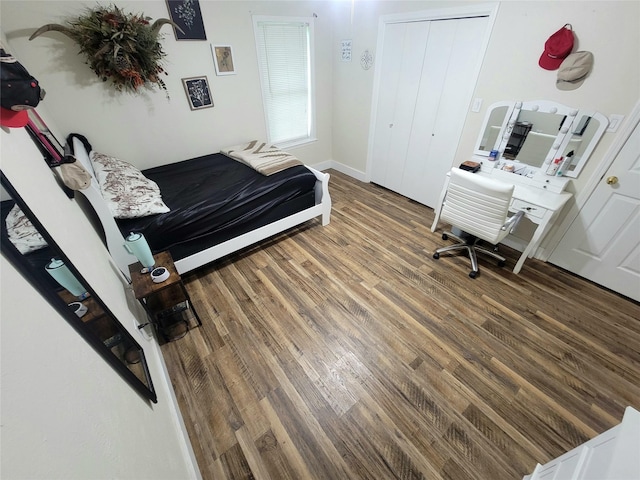 800 County Road 1030, Mount Pleasant, TX 75455 - bedroom with wood finished floors and a closet