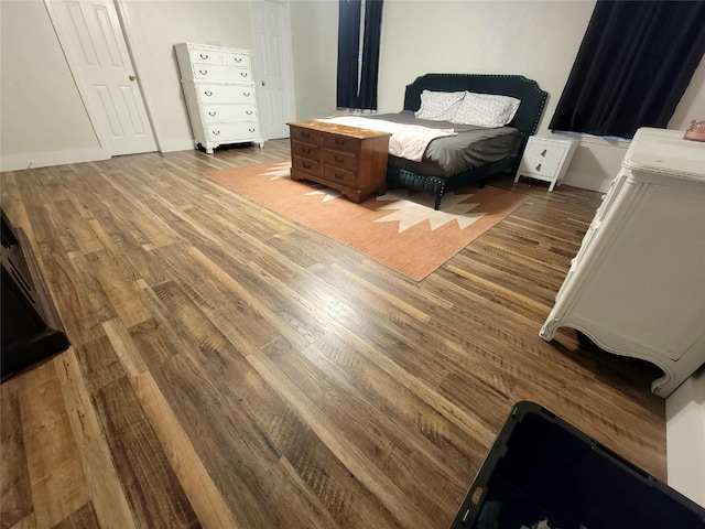 800 County Road 1030, Mount Pleasant, TX 75455 - bedroom with wood finished floors
