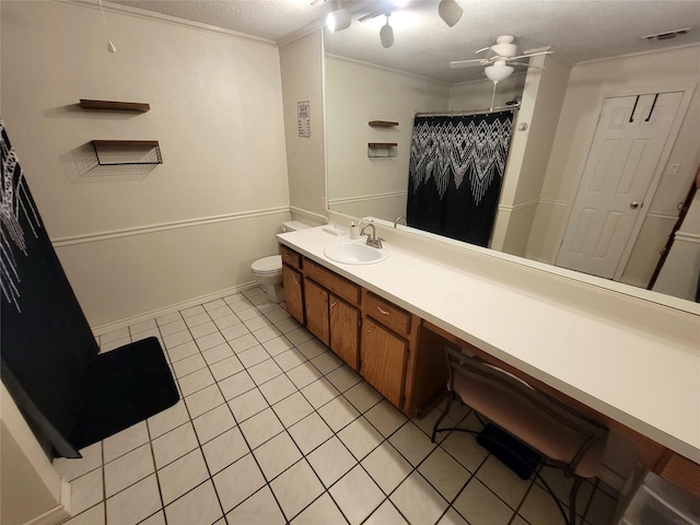 800 County Road 1030, Mount Pleasant, TX 75455 - full bath featuring tile patterned floors, vanity, a textured ceiling, ornamental molding, and curtained shower