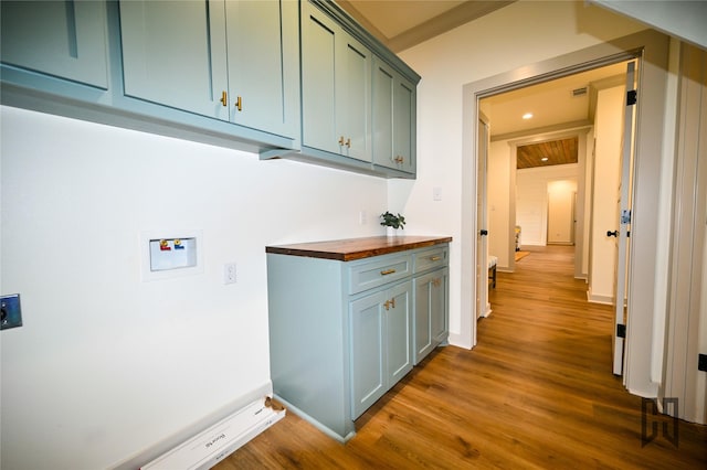 719 Germantown Rd, Minden, LA 71055 - washroom featuring cabinet space, dark wood-style floors, washer hookup, and recessed lighting