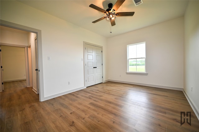 719 Germantown Rd, Minden, LA 71055 - unfurnished bedroom featuring wood finished floors and a ceiling fan