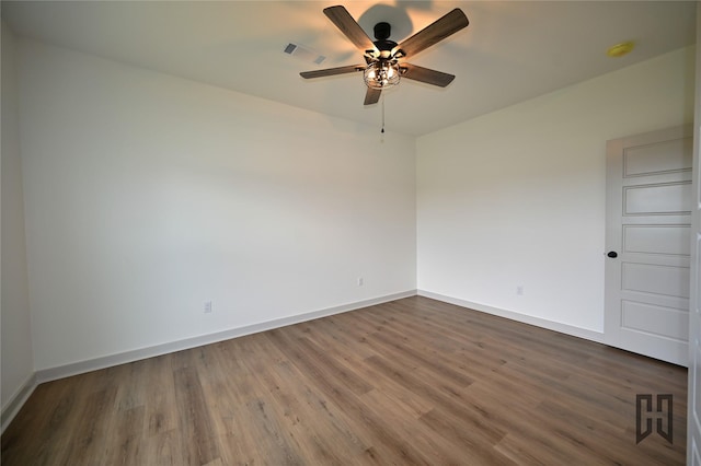 719 Germantown Rd, Minden, LA 71055 - unfurnished room with wood finished floors, ceiling fan, and a smoke detector