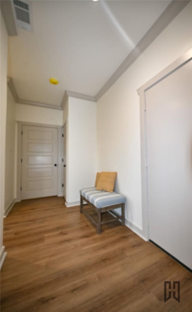 719 Germantown Rd, Minden, LA 71055 - hallway featuring wood finished floors and crown molding