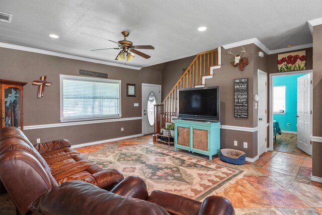 3120 Michele Ct, Weatherford, TX 76088 - living area with stairway, a ceiling fan, ornamental molding, and recessed lighting