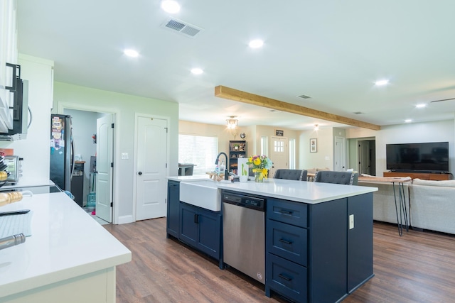 201 Roaring Springs Dr, Joshua, TX 76058 - kitchen featuring stainless steel appliances, blue cabinets, open floor plan, light countertops, and an island with sink