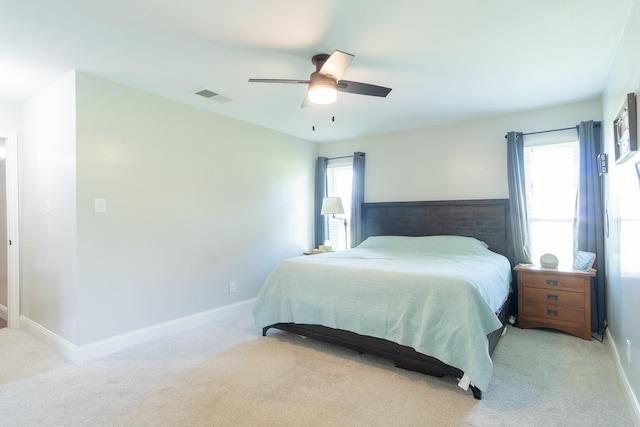 201 Roaring Springs Dr, Joshua, TX 76058 - bedroom featuring multiple windows, light colored carpet, and a ceiling fan