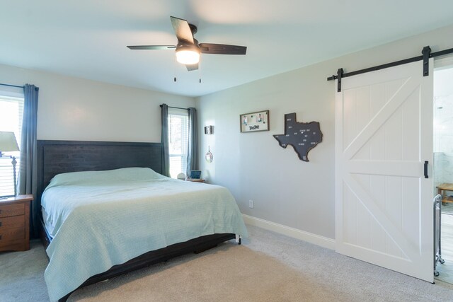 201 Roaring Springs Dr, Joshua, TX 76058 - bedroom featuring a barn door, carpet flooring, and ceiling fan