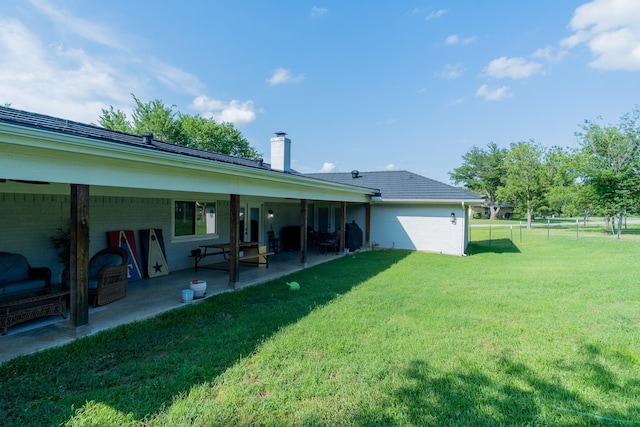 201 Roaring Springs Dr, Joshua, TX 76058 - rear view of property with a chimney and a patio