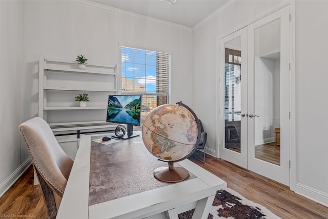 2010 Topaz Dr, Rockwall, TX 75087 - office area with french doors, wood finished floors, healthy amount of natural light, and crown molding