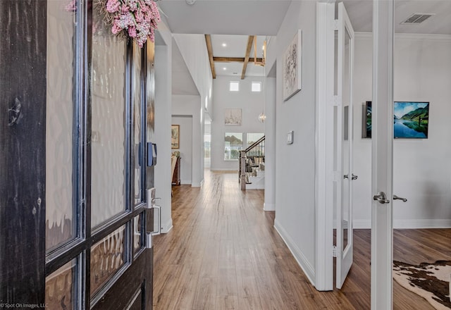 2010 Topaz Dr, Rockwall, TX 75087 - foyer with wood finished floors, stairway, and recessed lighting