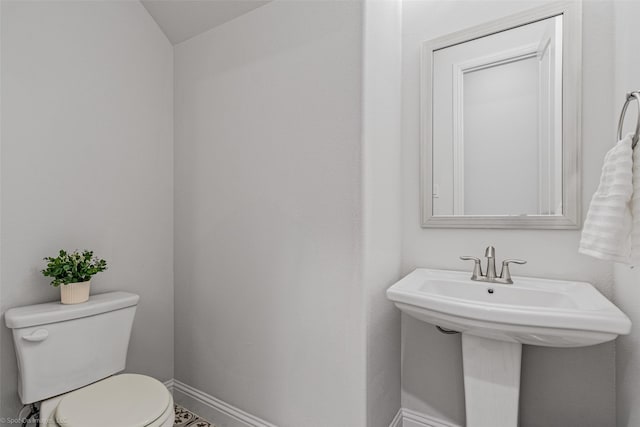 2010 Topaz Dr, Rockwall, TX 75087 - bathroom featuring toilet and baseboards