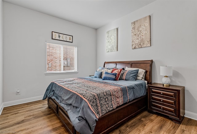 2010 Topaz Dr, Rockwall, TX 75087 - bedroom featuring wood finished floors and baseboards