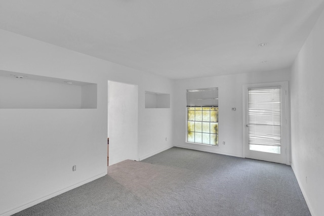 5201 Ranchero Ln, Dallas, TX 75236 - carpeted spare room with baseboards