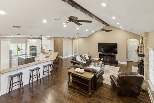 320 Tate Cir, Sherman, TX 75090 - living room featuring arched walkways, a ceiling fan, dark wood-type flooring, and recessed lighting