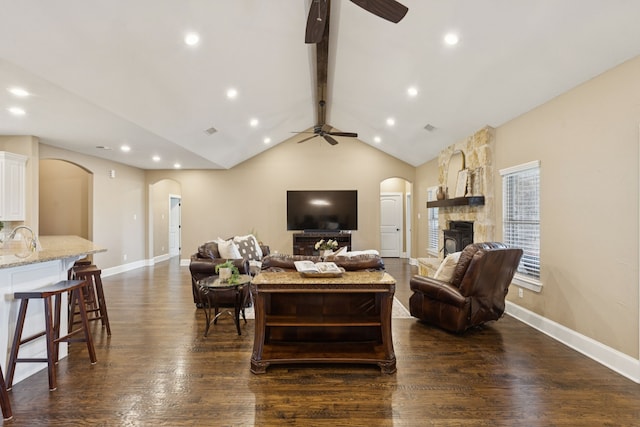 320 Tate Cir, Sherman, TX 75090 - living area with arched walkways, ceiling fan, dark wood-style flooring, and recessed lighting