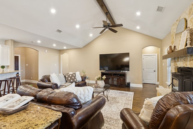 320 Tate Cir, Sherman, TX 75090 - living area featuring arched walkways, dark wood-style floors, ceiling fan, recessed lighting, and high vaulted ceiling