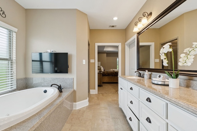 320 Tate Cir, Sherman, TX 75090 - ensuite bathroom featuring vanity and a garden tub