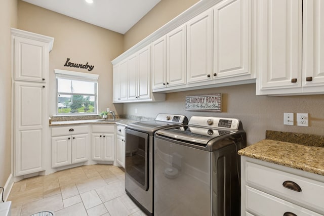 320 Tate Cir, Sherman, TX 75090 - laundry room featuring separate washer and dryer and cabinet space