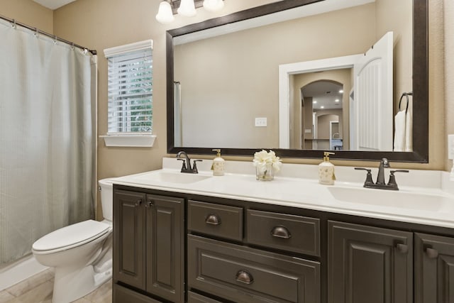 320 Tate Cir, Sherman, TX 75090 - bathroom featuring double vanity and a shower with curtain