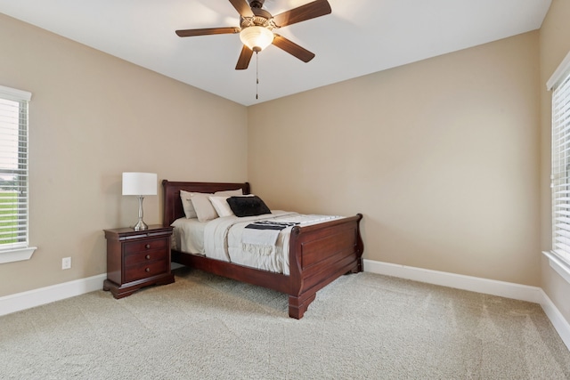 320 Tate Cir, Sherman, TX 75090 - carpeted bedroom featuring multiple windows and a ceiling fan