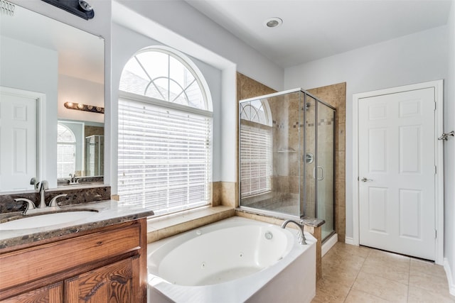 1308 Soaptree Ln, Fort Worth, TX 76177 - full bath featuring a jetted tub, a shower stall, vanity, and tile patterned floors