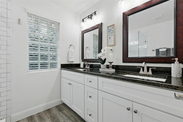 730 Emerald Sound Blvd, Oak Point, TX 75068 - full bathroom with double vanity and wood finished floors