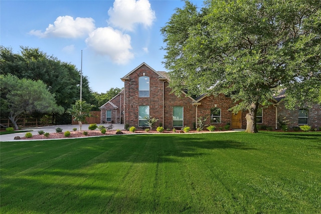 730 Emerald Sound Blvd, Oak Point, TX 75068 - view of front of property with a front yard and brick siding