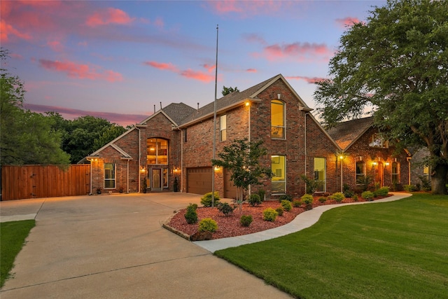 730 Emerald Sound Blvd, Oak Point, TX 75068 - traditional home featuring concrete driveway, an attached garage, a gate, and brick siding