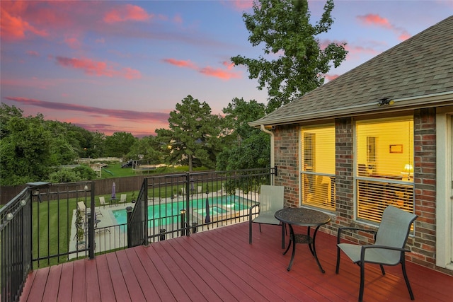 730 Emerald Sound Blvd, Oak Point, TX 75068 - deck at dusk featuring a fenced backyard, a pool with connected hot tub, and a patio