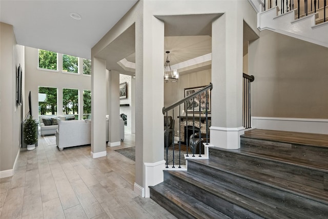 730 Emerald Sound Blvd, Oak Point, TX 75068 - entrance foyer featuring stairway, a chandelier, and wood finished floors