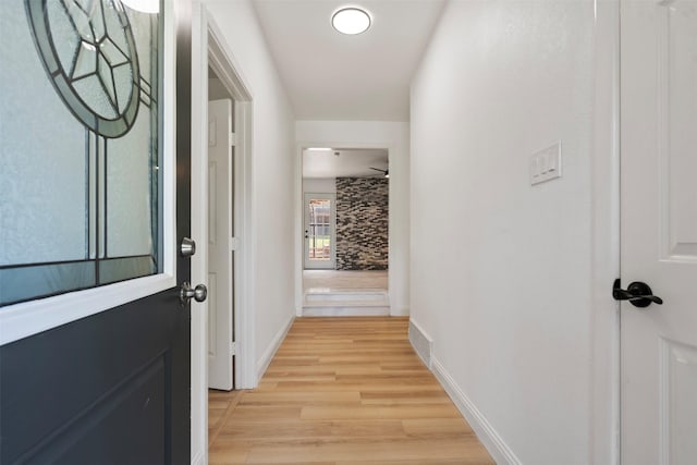 1228 Brookside Dr, Hurst, TX 76053 - hall featuring light wood-style floors and baseboards